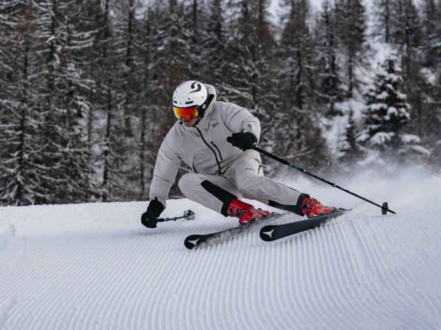 Skier skiing fast down the piste